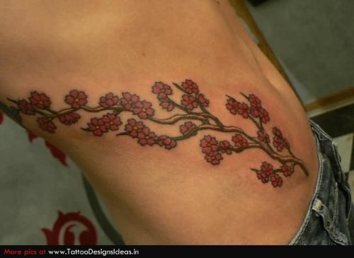 Cherry Blosoom Tattoo On Man Side Rib